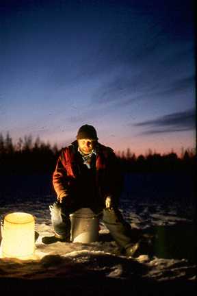 Man ice fishing
